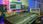 A sleek professional audio setup with microphones, speakers, and stage lighting in a modern event space.