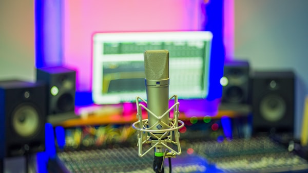 Neumann U87Ai microphone in a recording studio