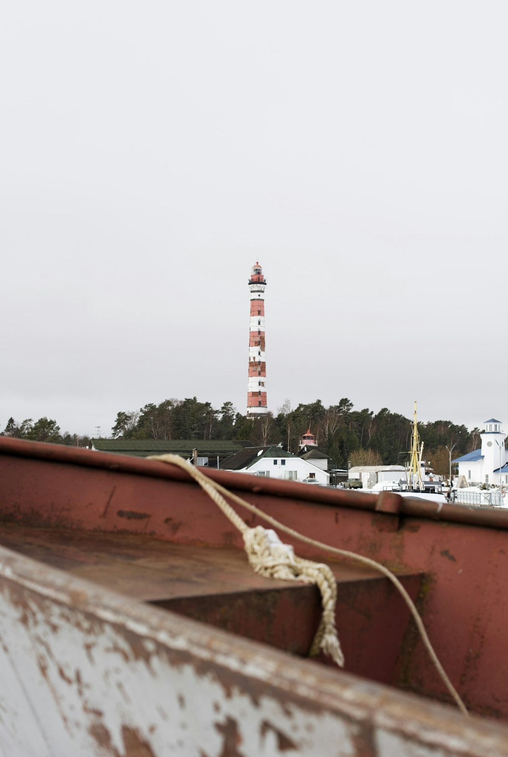 a view of a light house from a boat