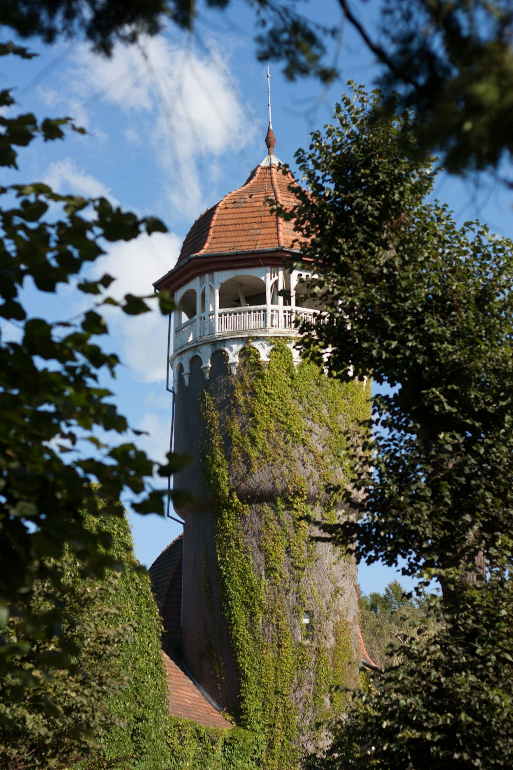 a tall tower with a clock on top of it