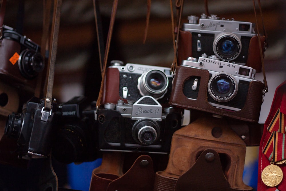 a group of cameras sitting on top of each other