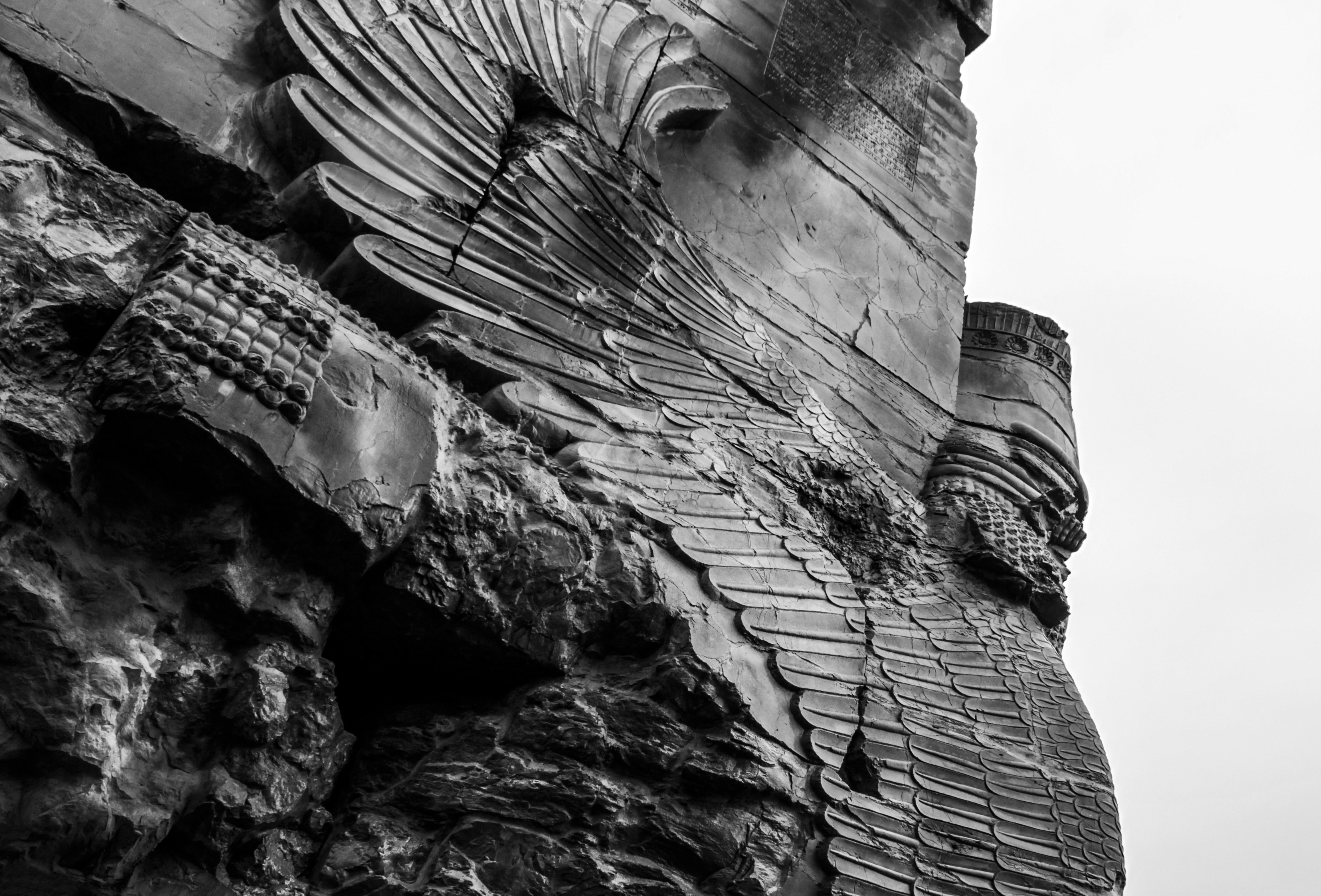 a black and white photo of a stone building