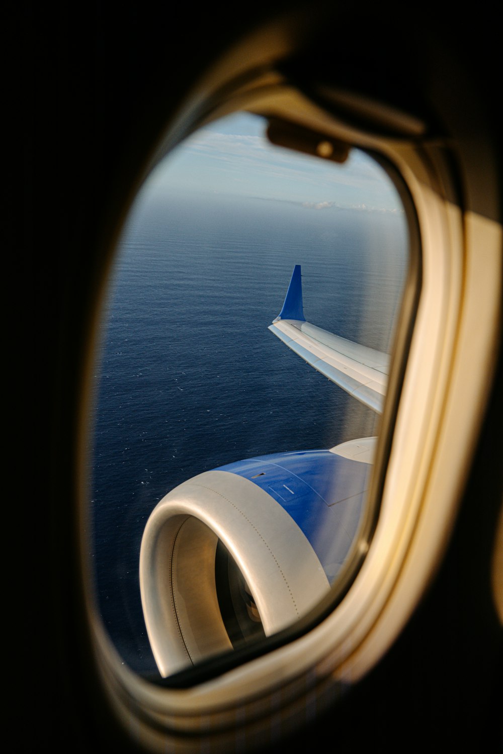 a view of the ocean from an airplane window