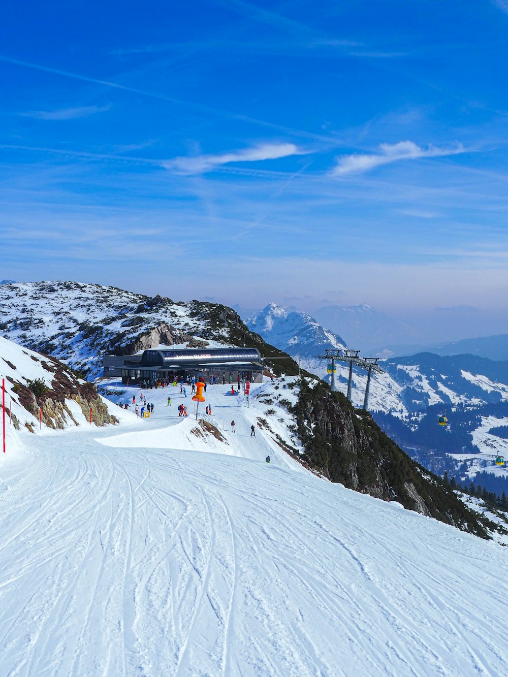 a person riding skis on a snowy surface