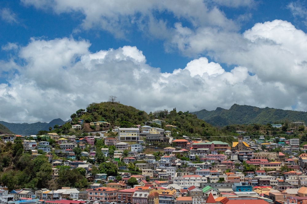 a view of a city with mountains in the background