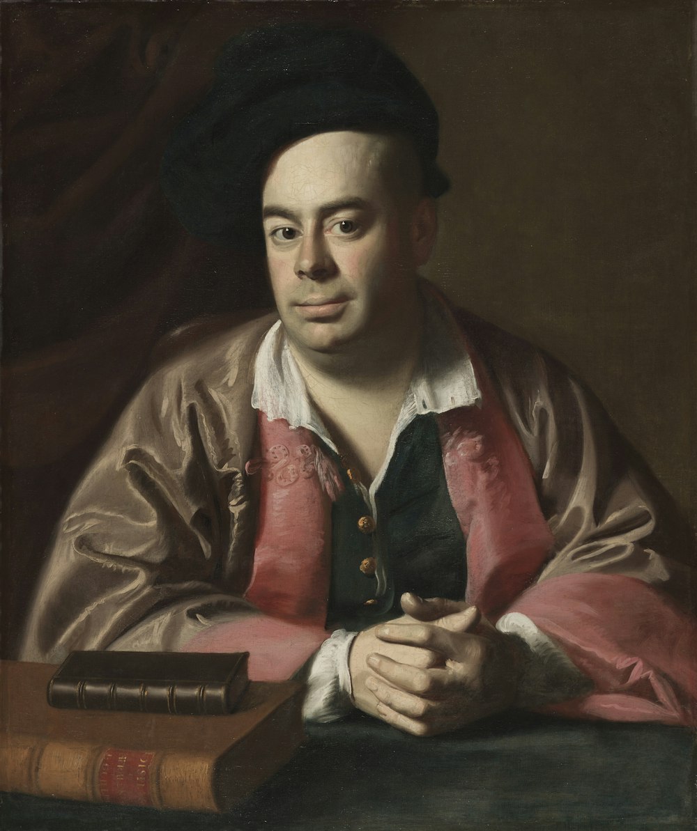 a painting of a man with a book