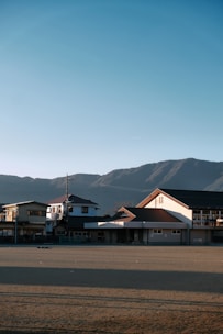 a town with mountains in the background