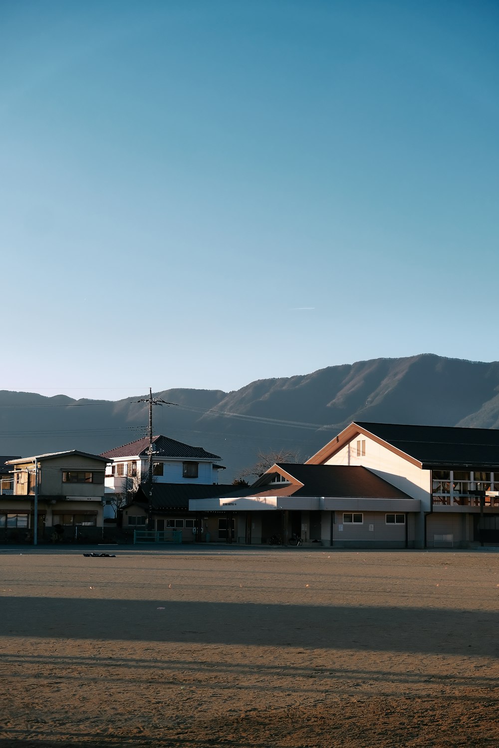 a town with mountains in the background