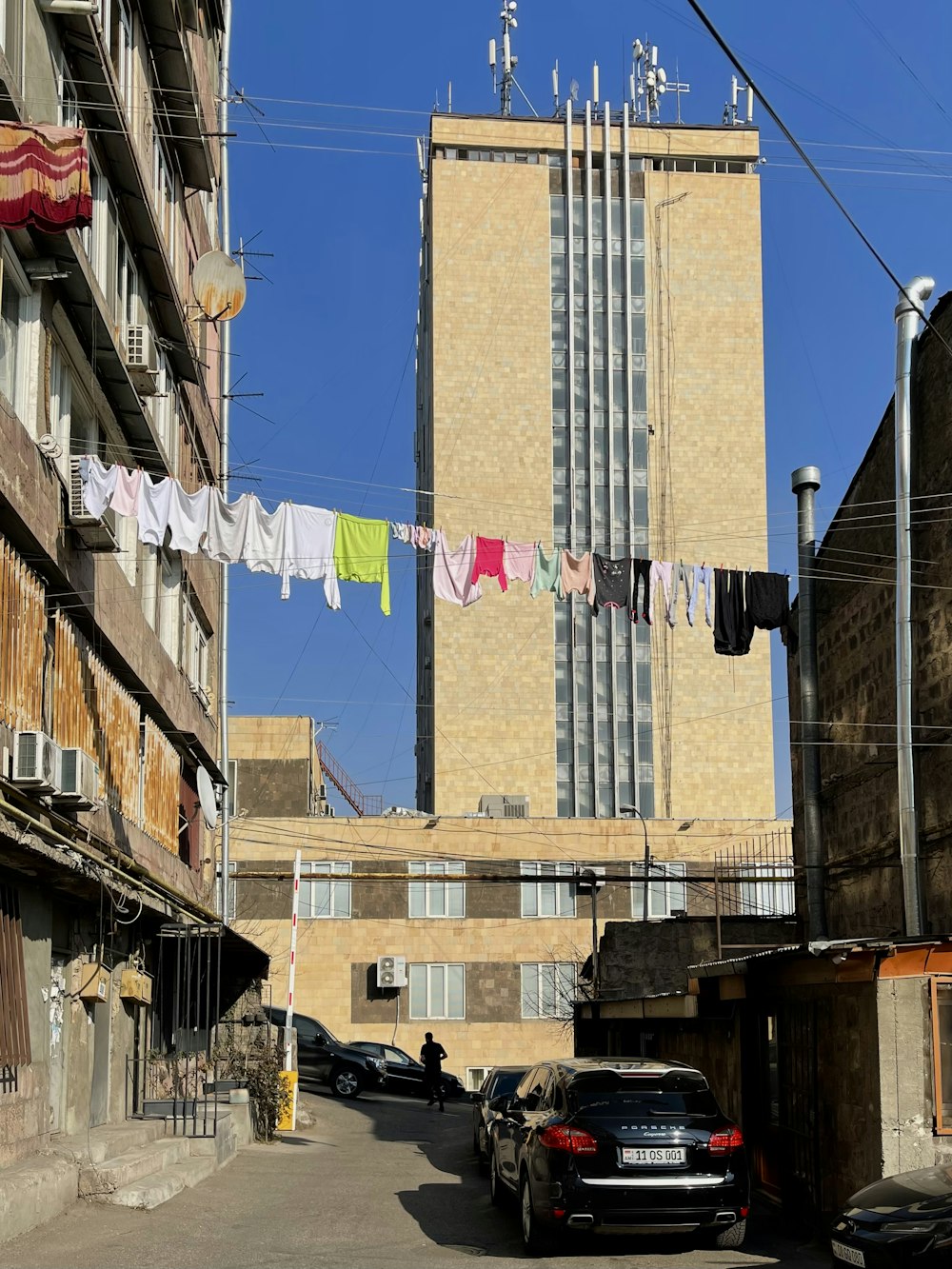 a city street with cars parked on the side of it