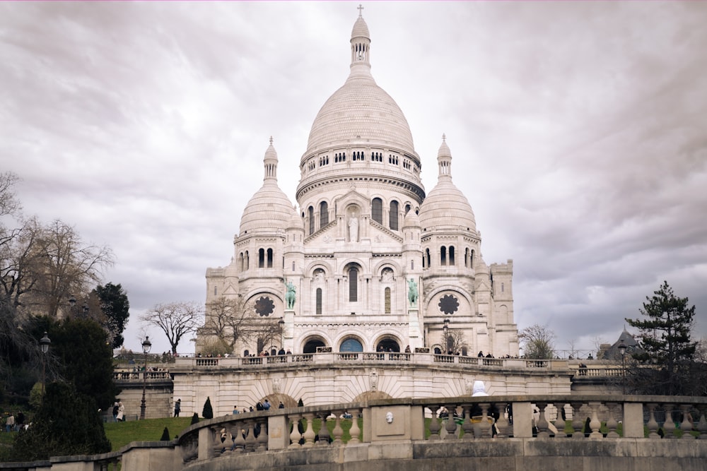 a large white building with a dome on top of it