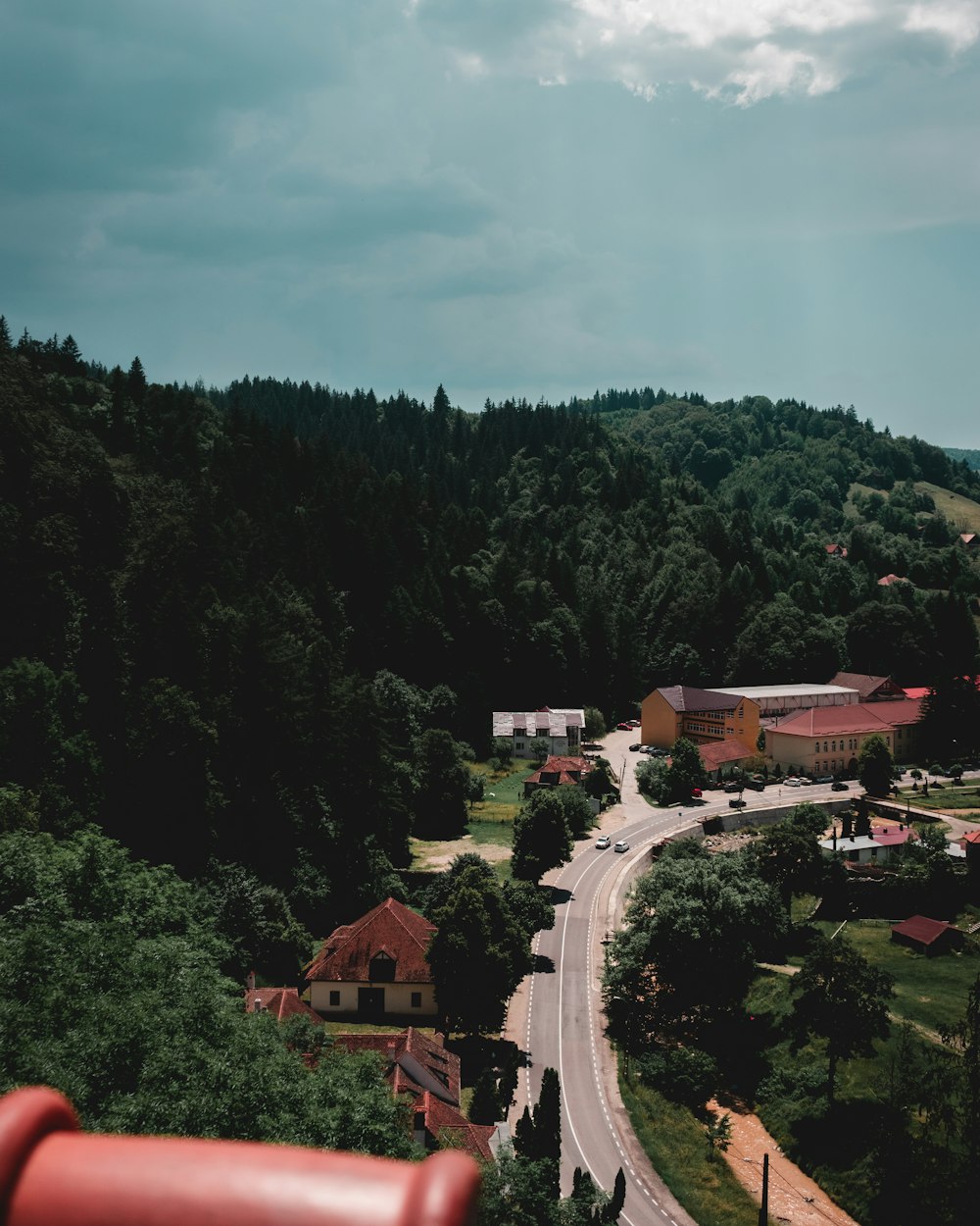 a scenic view of a road and a town