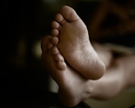 a close up of a person's bare feet