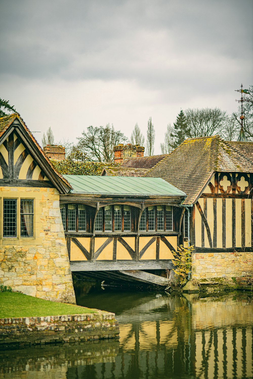 a building with a bridge over a body of water