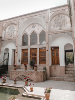a building with a fountain in front of it