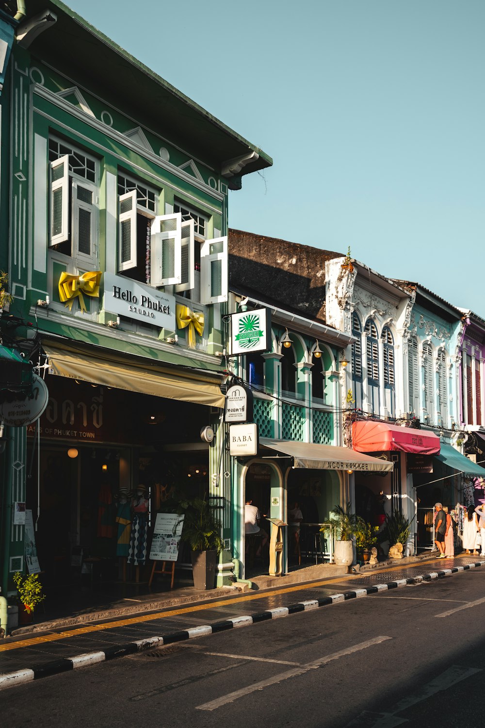 a row of buildings on the side of a street