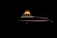 Close-up of guitar strings and drumsticks, emphasizing the instruments' textures