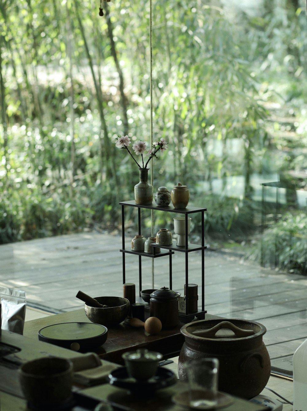 a table that has some pots and bowls on it