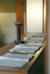 a table with a bunch of papers on it