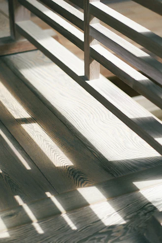 white oak hardwood wooden bench on wooden floor