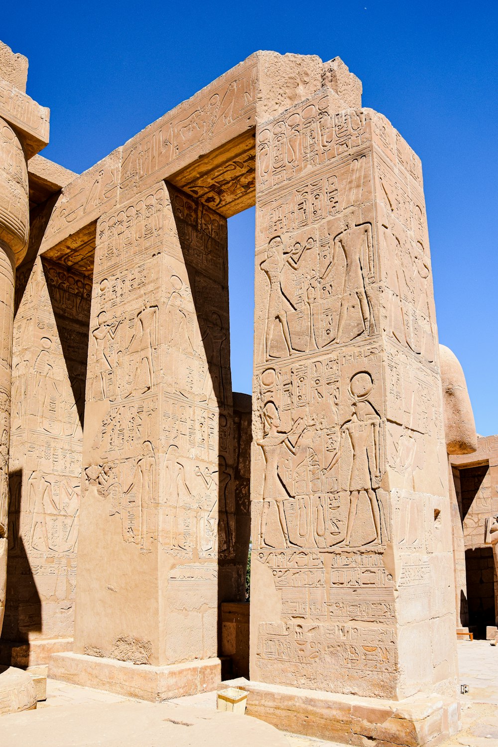 a large stone structure with egyptian writing on it