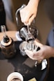 a person pours coffee into a cup