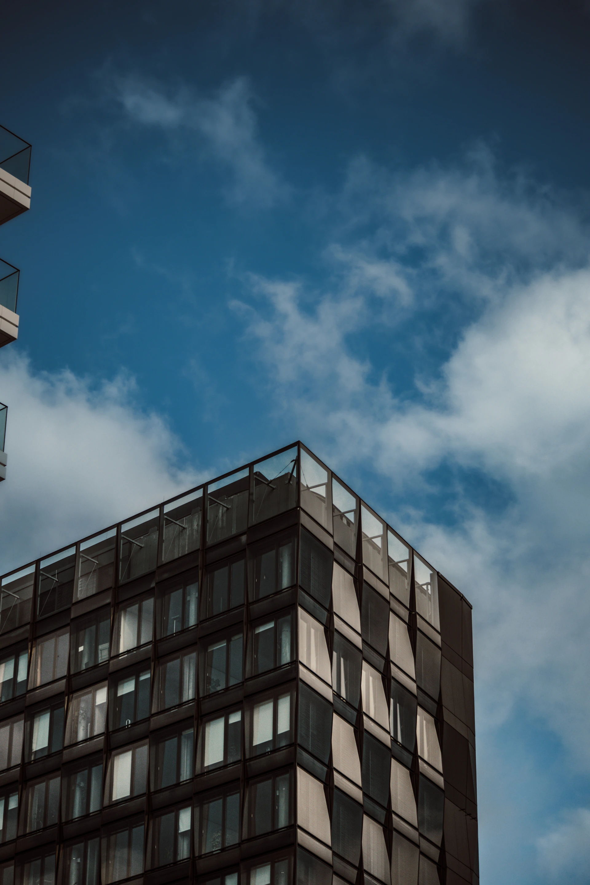 a tall building with a clock on the top of it
