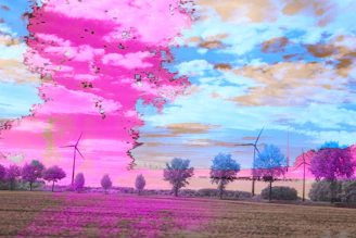 Interactive glassmorphic card displaying a digital twin simulation of a wind farm with glowing cyan accents.