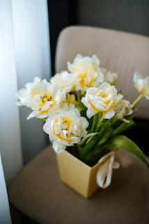 A seasonal Mother’s Day gift box featuring fresh peonies paired with a small music box.