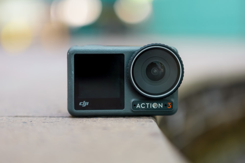 a small camera sitting on top of a table