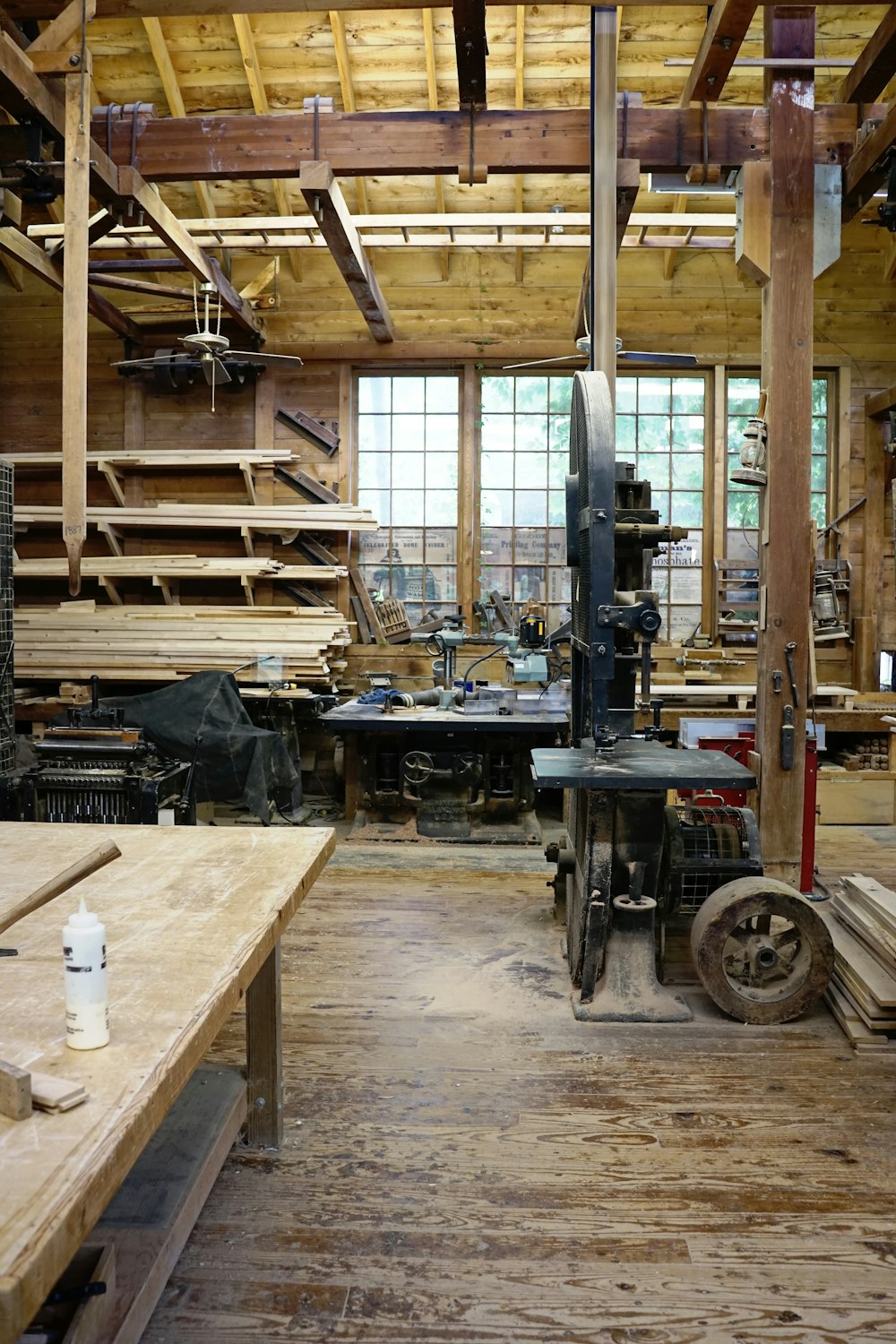 a wood shop with a lot of woodworking tools