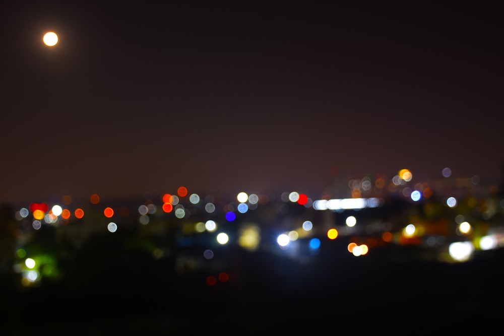 a blurry photo of a city at night