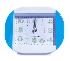 A clock showing a designated safe hour for activities.