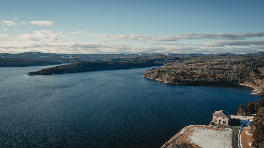 a large body of water surrounded by trees