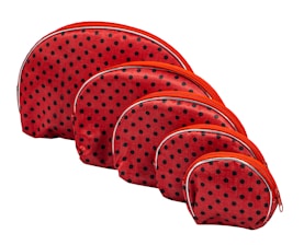 A set of four half-circle shaped pouches with a red background and black polka dots. The zippers are a vibrant orange-red color. The pouches are arranged in a line from largest to smallest, showcasing the gradient in size.