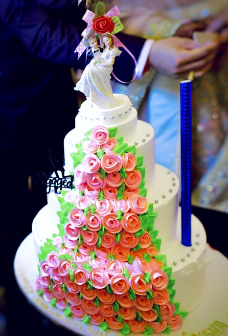 A stunning fondant cake designed for a wedding celebration.