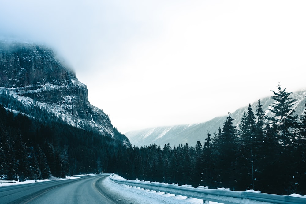 a road with a mountain in the background