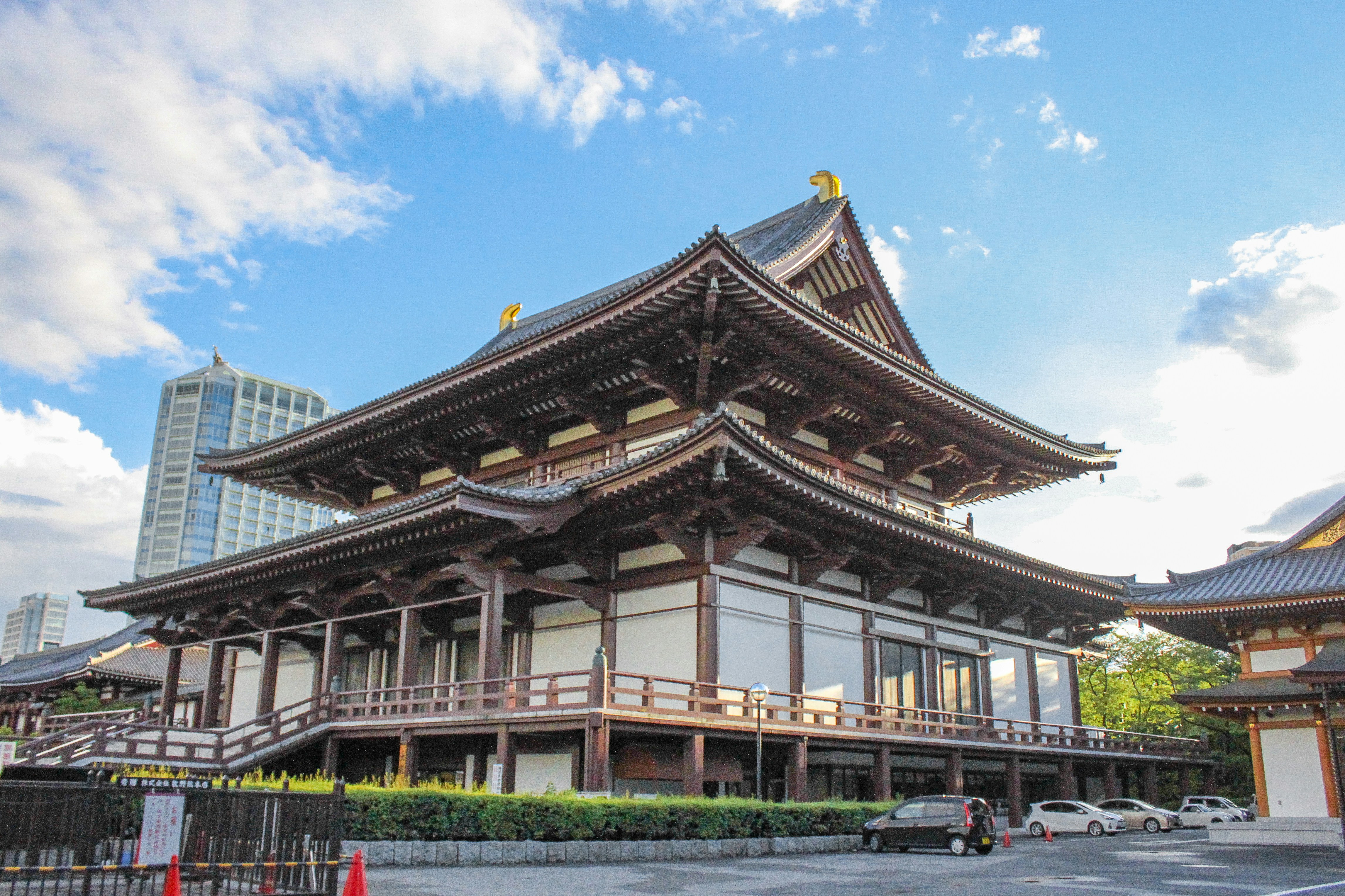 a tall building with a tall tower on top of it, Japanese style building