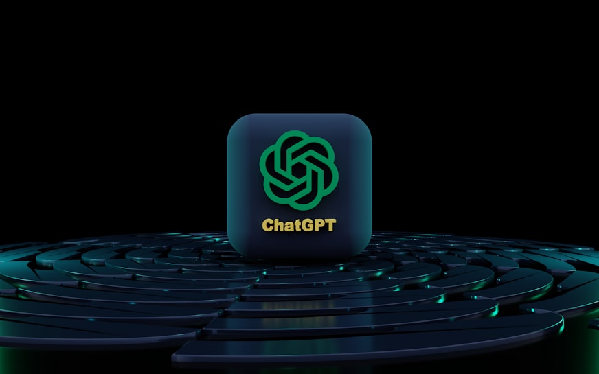 An icon with the logo of ChatGPT is placed at the center, standing out against a dark, futuristic, circular layered background with blue lighting accents.