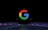 a close up of a computer keyboard with the google logo on it
