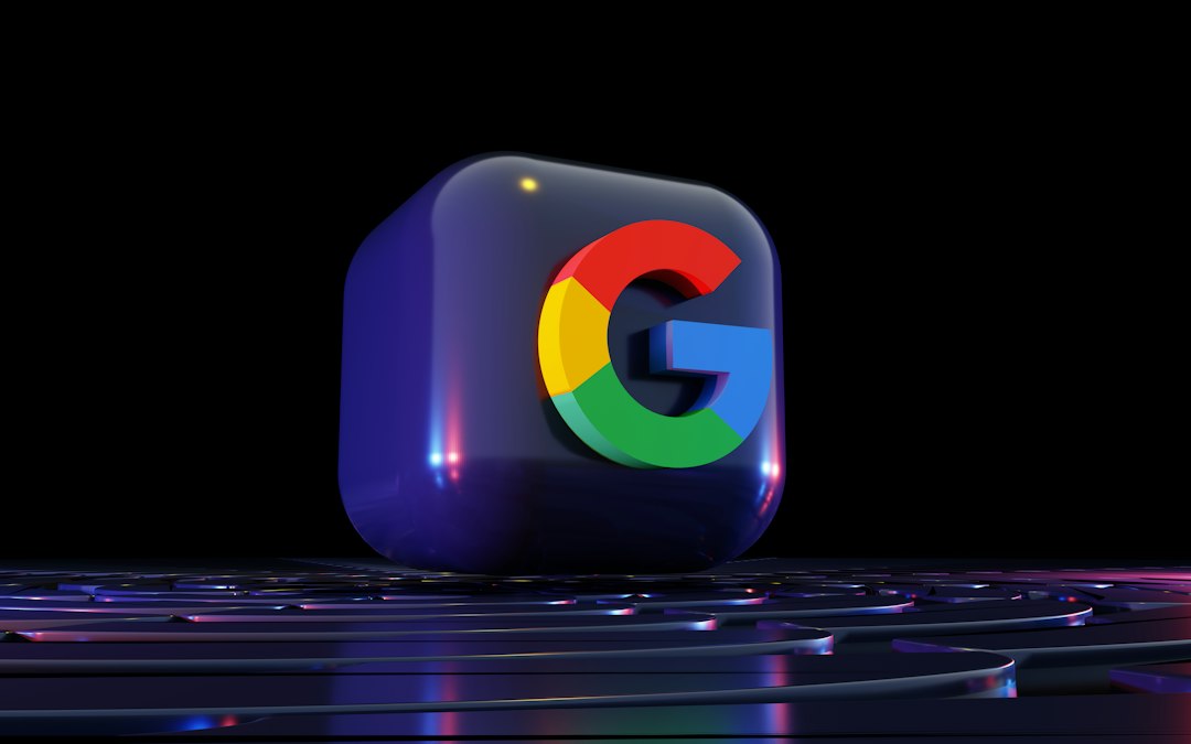 a close up of a computer keyboard with the google logo on it