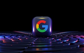 a google logo sitting on top of a computer keyboard