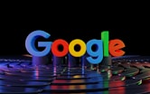 the google logo is displayed in front of a black background