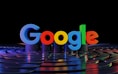 the google logo is displayed in front of a black background