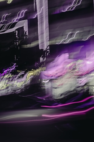 Visual of a cinematic trap music video scene with neon cityscape and dynamic lighting effects.