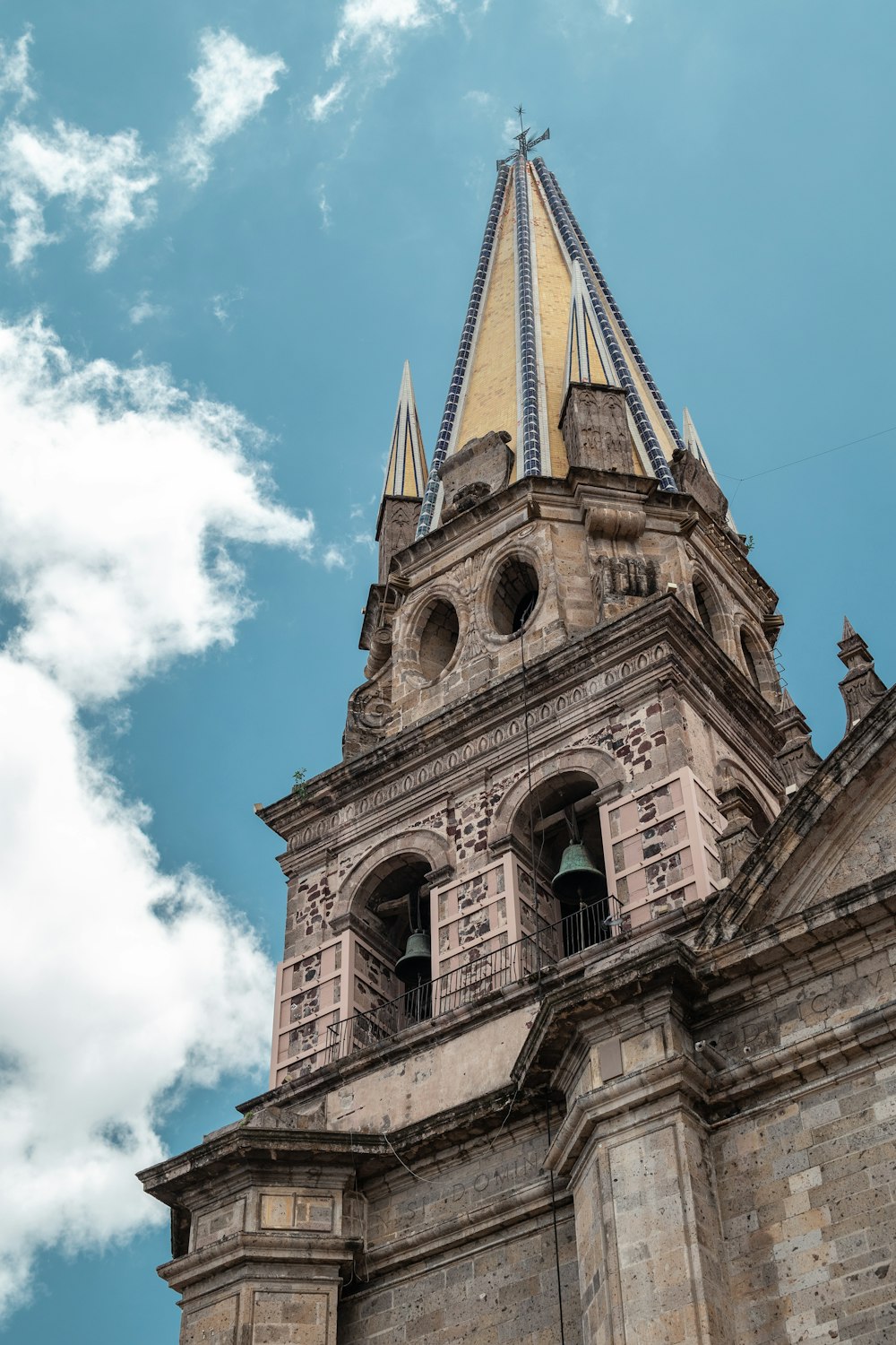 a tall clock tower with a sky background