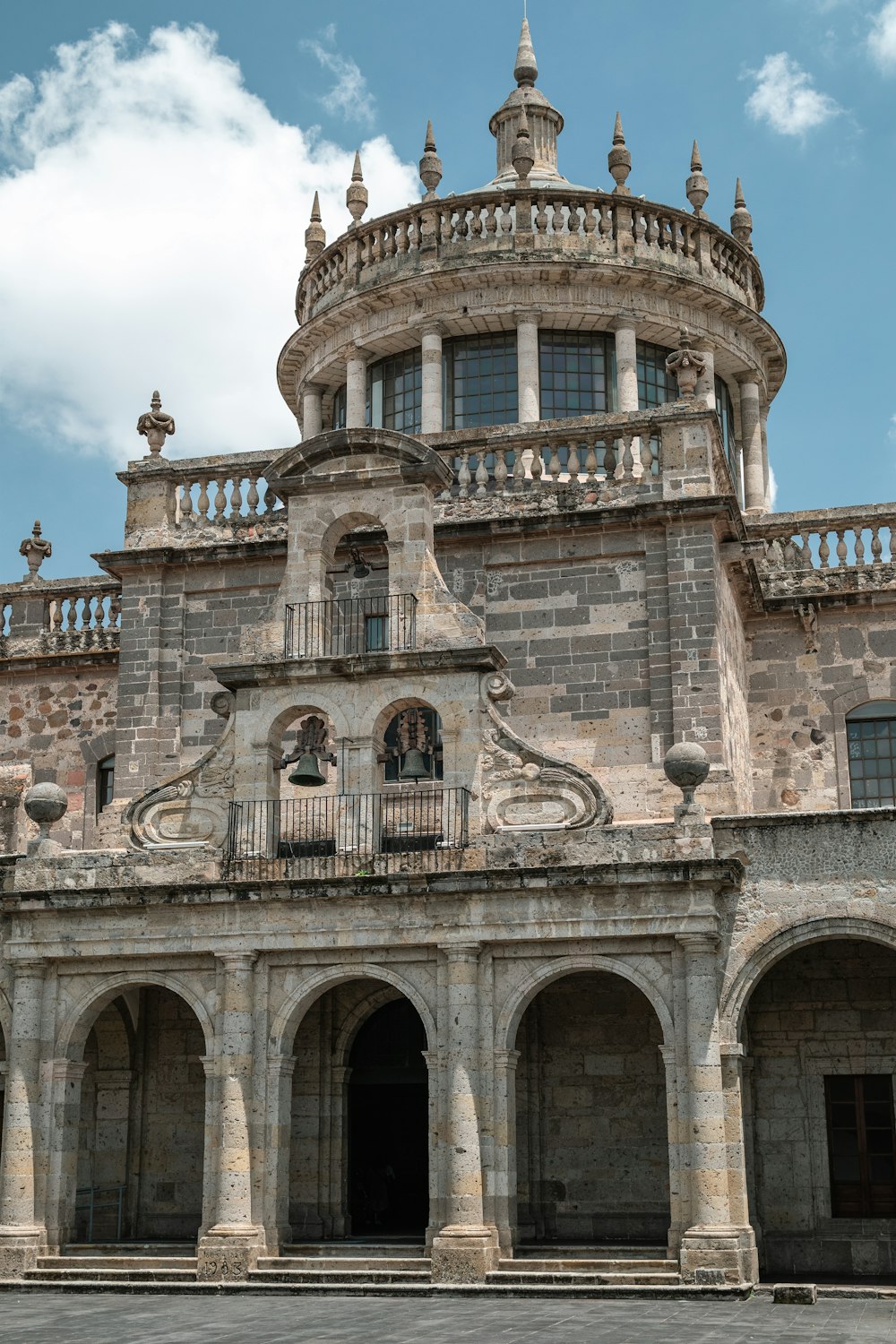 a large building with a clock on the top of it