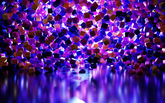 A vibrant 3D scene with glowing red, yellow, and blue building blocks and toy rockets floating against a dark purple gradient background.