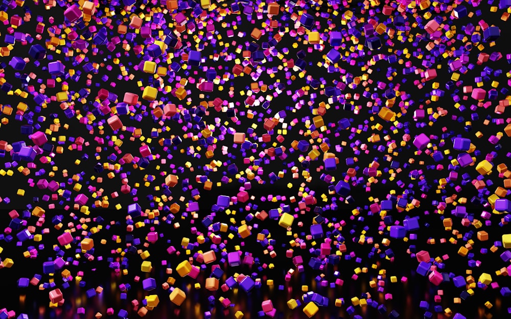 a large group of colorful objects floating in the air