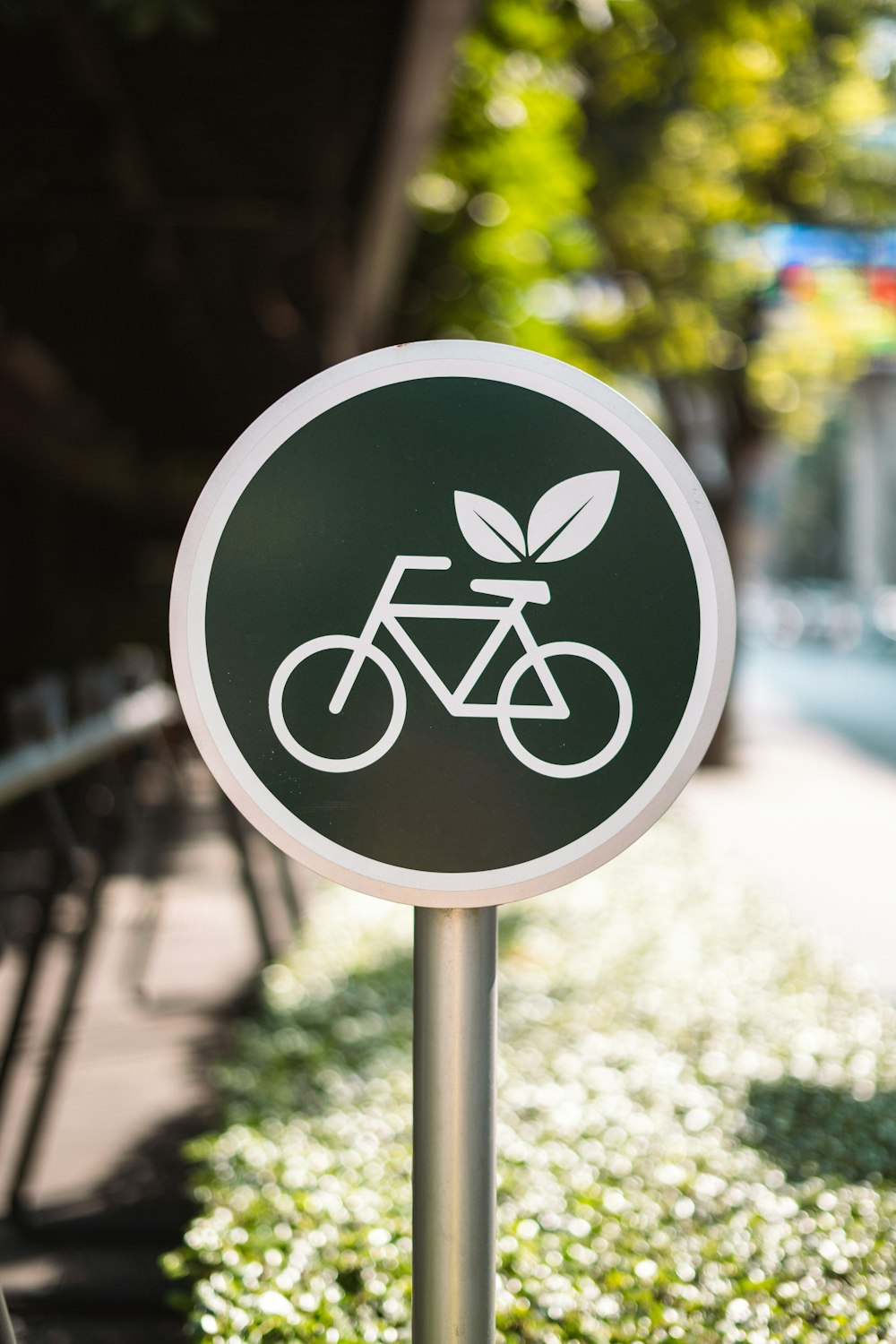 a street sign with a bicycle on it