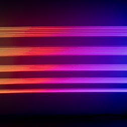 Horizontal neon lights in shades of purple, pink, and red create a vivid and futuristic visual effect against a dark background.